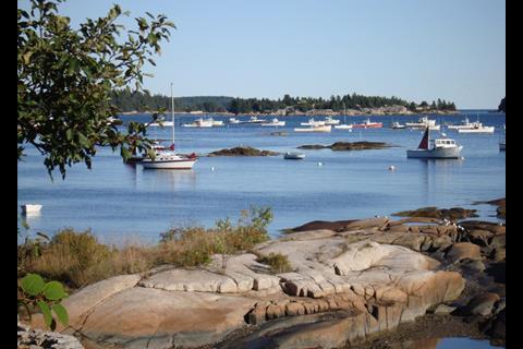 Lobster boats are moored in safe harbor near Stonington, Maine. Credit: Gabriel Nordyke/Marine Photobank